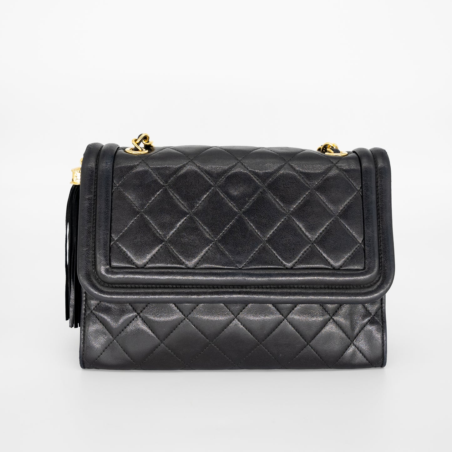 Sold at Auction: A Chanel sand-coloured quilted lambskin leather bag, 1980s